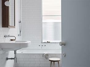 Sleek white-tiled bathroom project